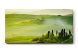 Sinus Art Wandbild 120x80cm Traumhafte Aussicht über die grünen Hügel der Toskana im frühen Sonnenlicht