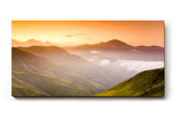 Sinus Art Wandbild 120x80cm Sanfte Hügellandschaft mit Lichtstimmung und Weitblick auf Bergketten