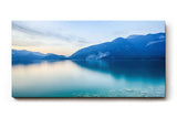 Sinus Art Wandbild 120x80cm Die Spiegelung im Wasser und die klaren Steine im Vordergrund vermitteln Ruhe und Weite