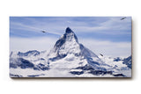 Sinus Art Wandbild 120x80cm Imposantes Matterhorn umgeben von Gletschern und schwebenden Vögeln