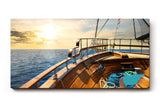 Sinus Art Wandbild 120x80cm Atmosphärisches Meermotiv mit Perspektive vom Holzdeck eines Segelboots bei Sonnenuntergang