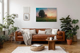 Sinus Art Wandbild 120x80cm Grüne Wiese im goldenen Morgenlicht mit Baumgruppe für eine friedliche Raumwirkung