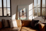 Paul Sinus Wandbild in 40x60cm Sunlight in Manhattan – Frau auf Balkon mit Blick auf Empire State Building, sonnendurchflutetes Stadtmotiv