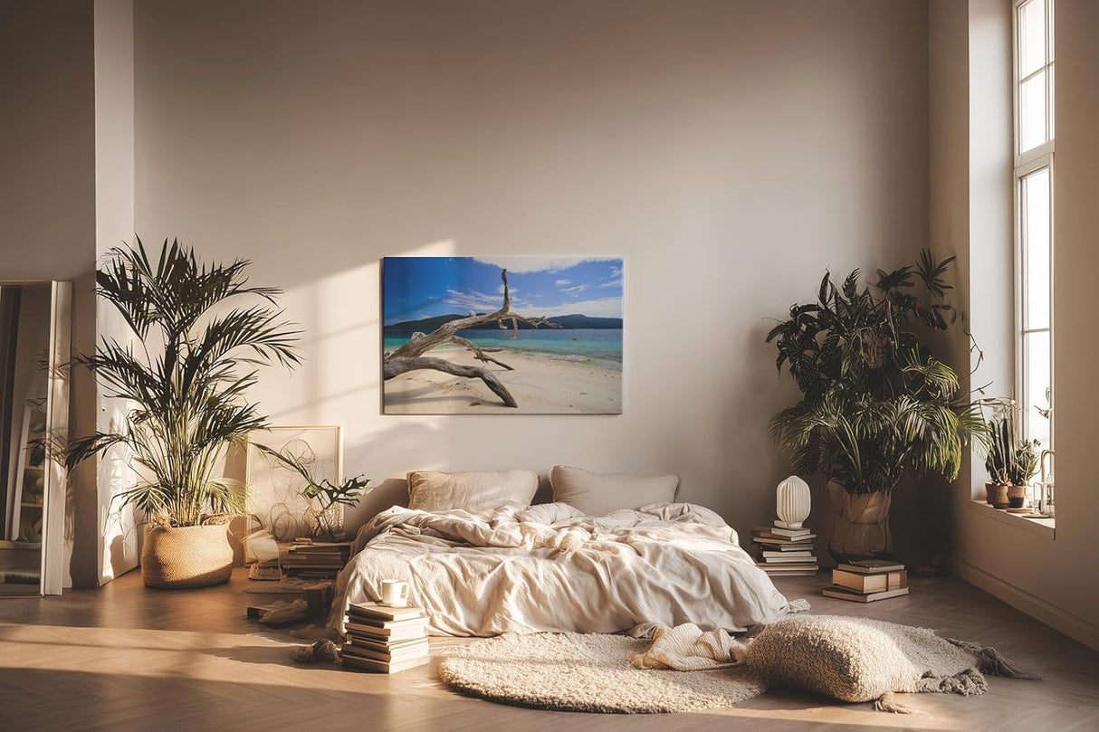 Sinus Art Wandbild 120x80cm Faszinierendes Motiv mit Treibholz am weißen Sandstrand vor türkisfarbenem Meer