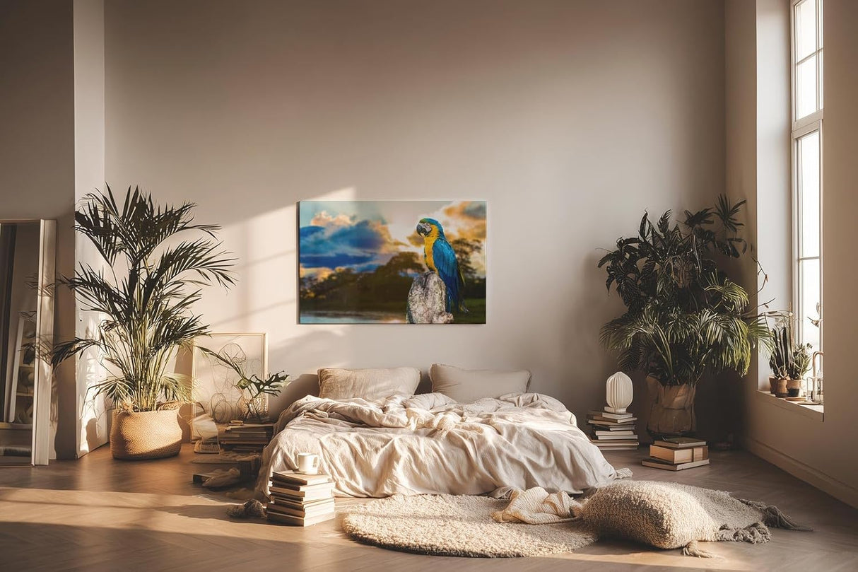 Sinus Art Wandbild 120x80cm Farbenfroher Ara auf Baumstamm mit stimmungsvoller Himmelsszenerie in der Natur