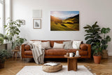 Sinus Art Wandbild 120x80cm Grüne Hügel unter strahlender Sonne mit leuchtenden Bäumen und weiter Perspektive