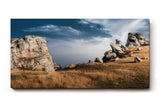 Sinus Art Wandbild 120x80cm Markante Felsformationen unter blauem Himmel in dramatischer Weite