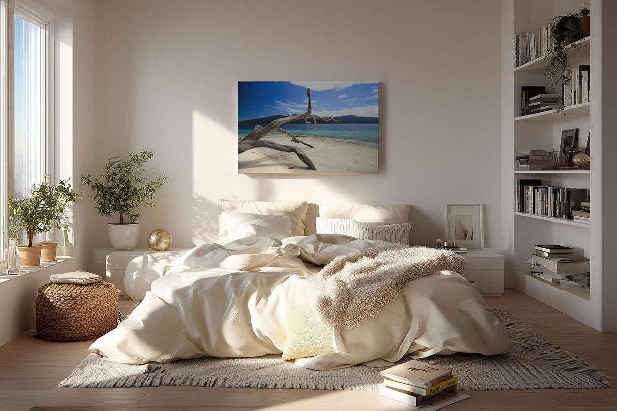 Sinus Art Wandbild 120x80cm Faszinierendes Motiv mit Treibholz am weißen Sandstrand vor türkisfarbenem Meer