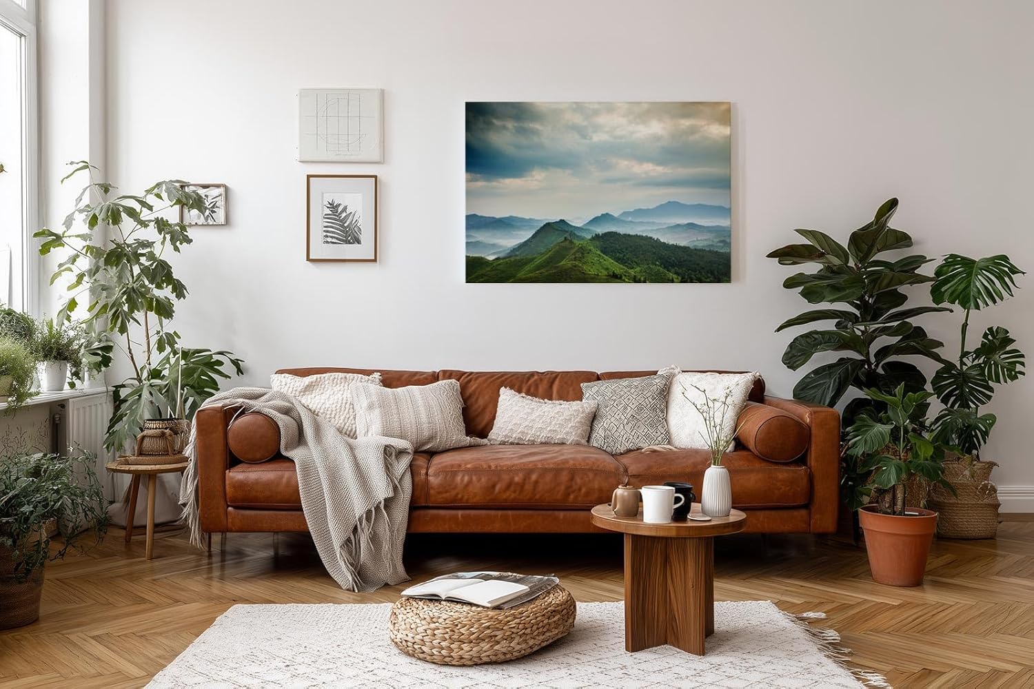 Sinus Art Wandbild 120x80cm Weite grüne Hügel und Berge unter wolkenverhangenem Himmel mit Lichteinfall
