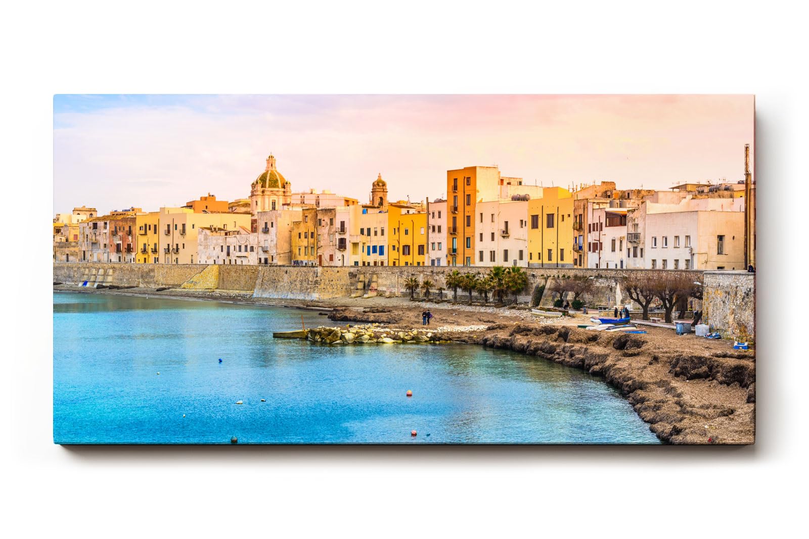 Sinus Art Wandbild 120x80cm Pastellfarbene Häuserzeile an der Küste vor türkisblauem Meer – mediterranes Flair pur