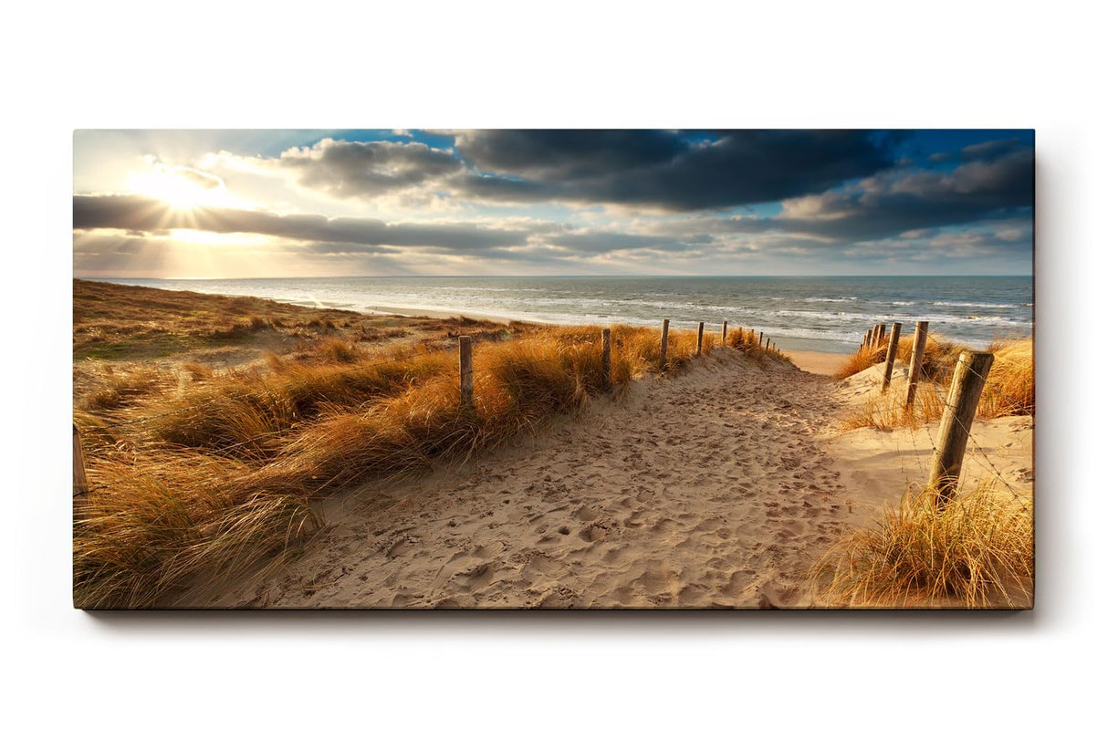 Sinus Art Wandbild 120x80cm Sandweg durch Dünen in goldener Abendstimmung für entspannte Raumwirkung