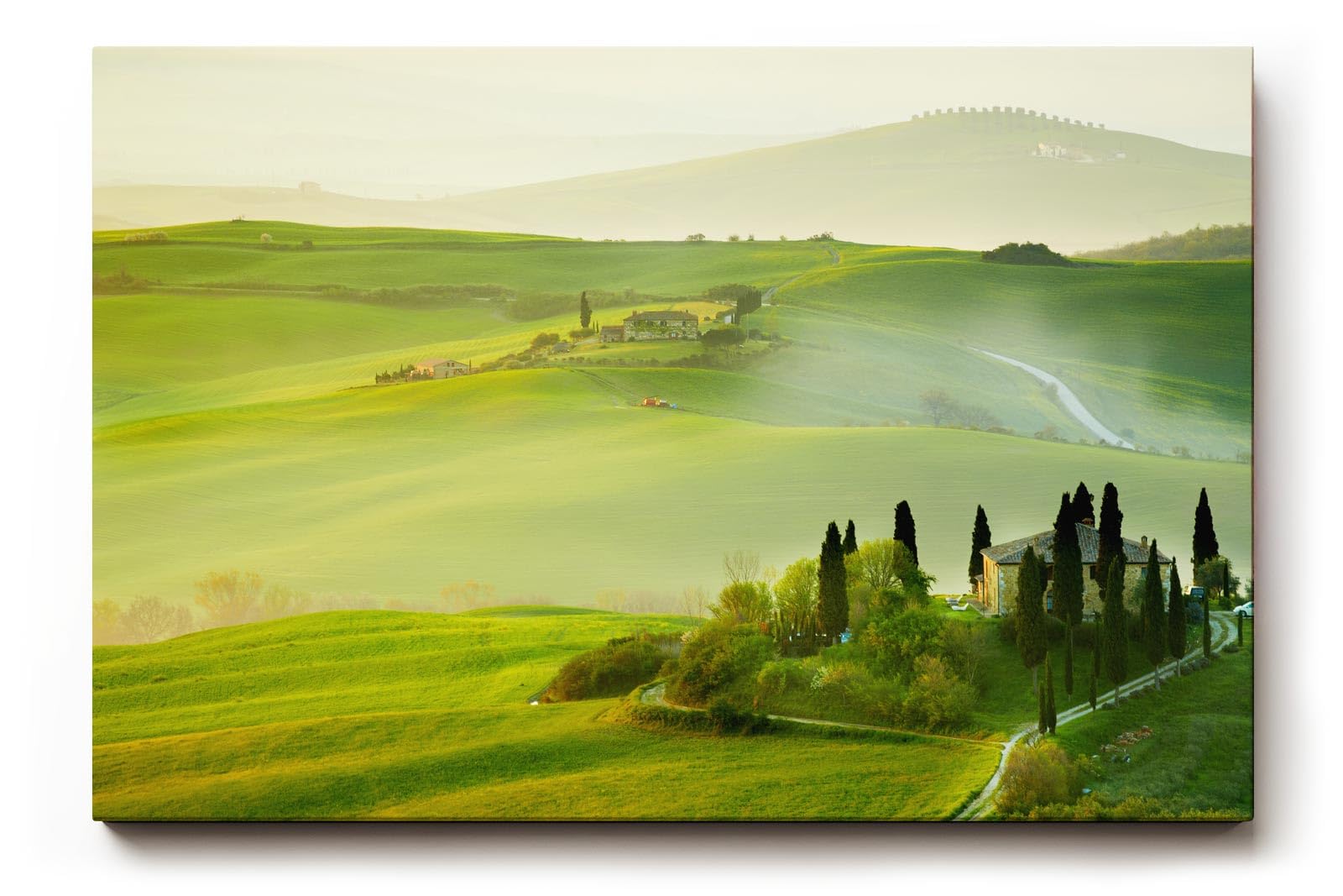 Sinus Art Wandbild 120x80cm Traumhafte Aussicht über die grünen Hügel der Toskana im frühen Sonnenlicht