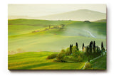 Sinus Art Wandbild 120x80cm Traumhafte Aussicht über die grünen Hügel der Toskana im frühen Sonnenlicht