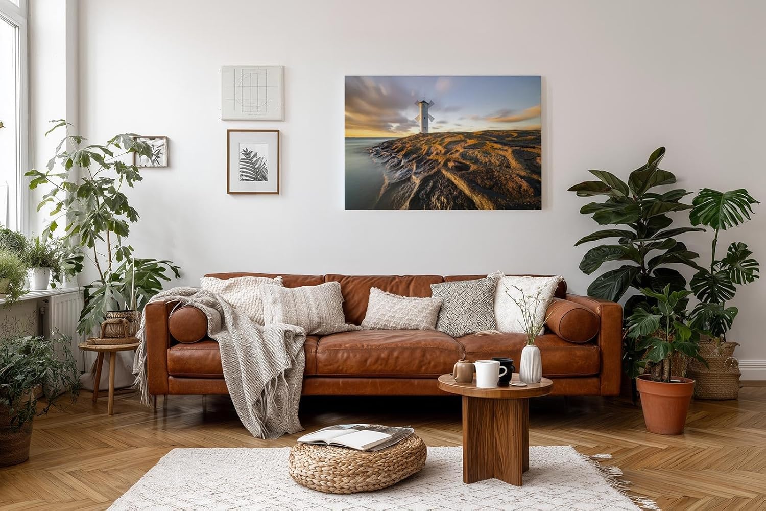 Sinus Art Wandbild 120x80cm Faszinierendes Motiv eines Leuchtturms auf strukturierten Felsen im Abendlicht