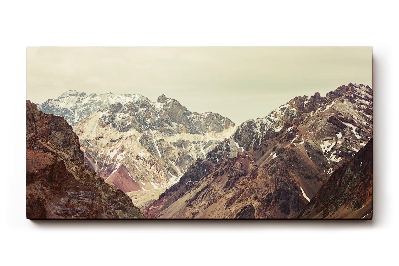 Sinus Art Wandbild 120x80cm Felsige Gebirgsketten mit schneebedeckten Gipfeln in beeindruckender Tiefe