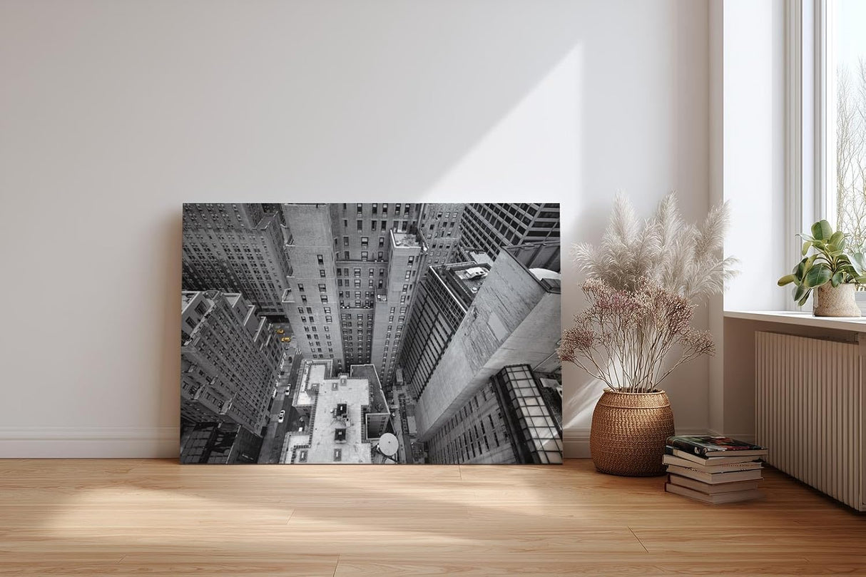 Sinus Art Wandbild 120x80cm Atemberaubende Ansicht einer Metropole aus der Vogelperspektive in Schwarzweiß mit gelben Taxis