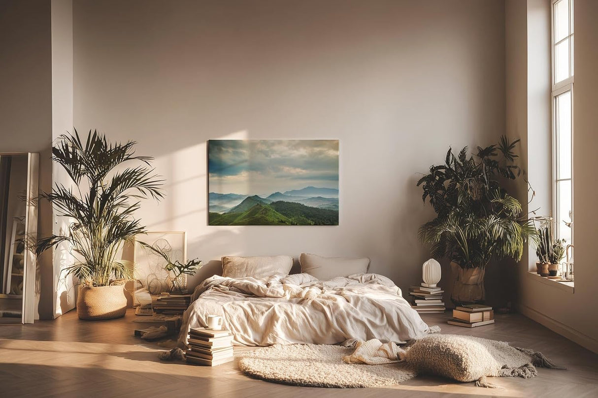 Sinus Art Wandbild 120x80cm Weite grüne Hügel und Berge unter wolkenverhangenem Himmel mit Lichteinfall