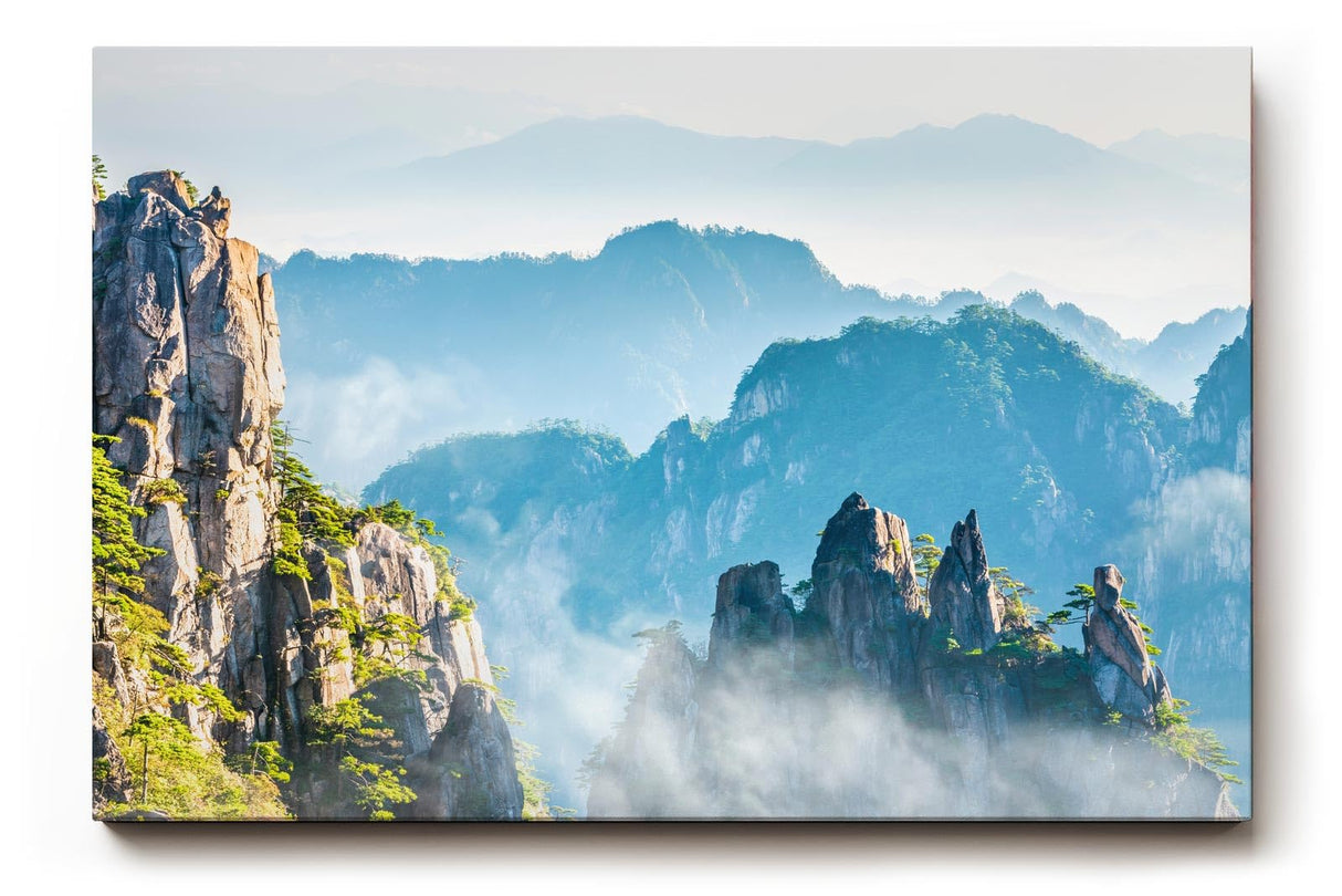 Sinus Art Wandbild 120x80cm Zerklüftete Bergformationen im Nebelmeer für eine ruhige und geheimnisvolle Raumwirkung