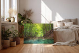 Sinus Art Wandbild 120x80cm Friedlicher Fluss mit glasklarem Wasser inmitten eines grünen Laubwaldes
