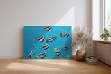 Sinus Art Wandbild 120x80cm Schwarm eleganter Bannerfische in natürlicher Bewegung – faszinierendes Meeresmotiv