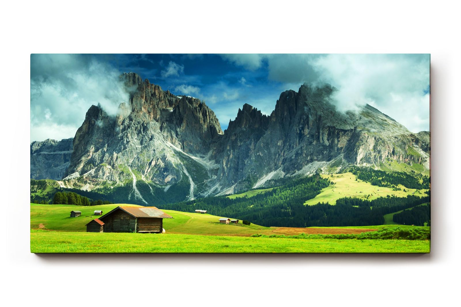 Sinus Art Wandbild 120x80cm Weite Almwiese mit dramatischer Bergkulisse und Hütten – frisch, ehrlich, kraftvoll