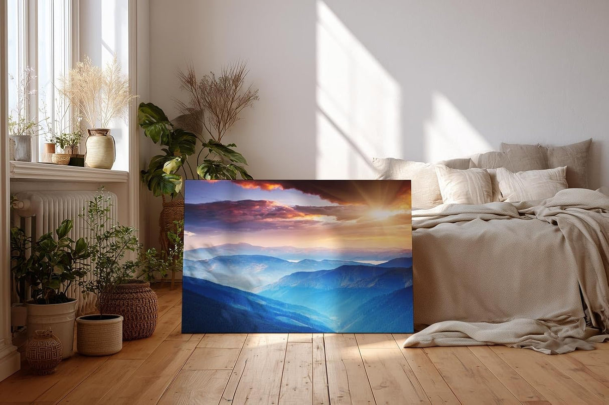 Sinus Art Wandbild 120x80cm Faszinierende Berglandschaft in verschiedenen Blauabstufungen mit goldener Sonne