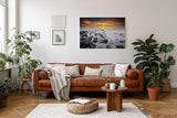 Sinus Art Wandbild 120x80cm Ruhiges Küstenmotiv mit Felsen im Wasser und goldenem Sonnenuntergang