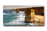 Sinus Art Wandbild 120x80cm Mächtige Sandsteinfelsen umgeben vom Ozean – imposant, dynamisch und zeitlos