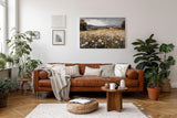 Sinus Art Wandbild 120x80cm Sanftes Naturmotiv mit blühender Wiese, Wildblumen und Bauernhof in weiter Hügellandschaft