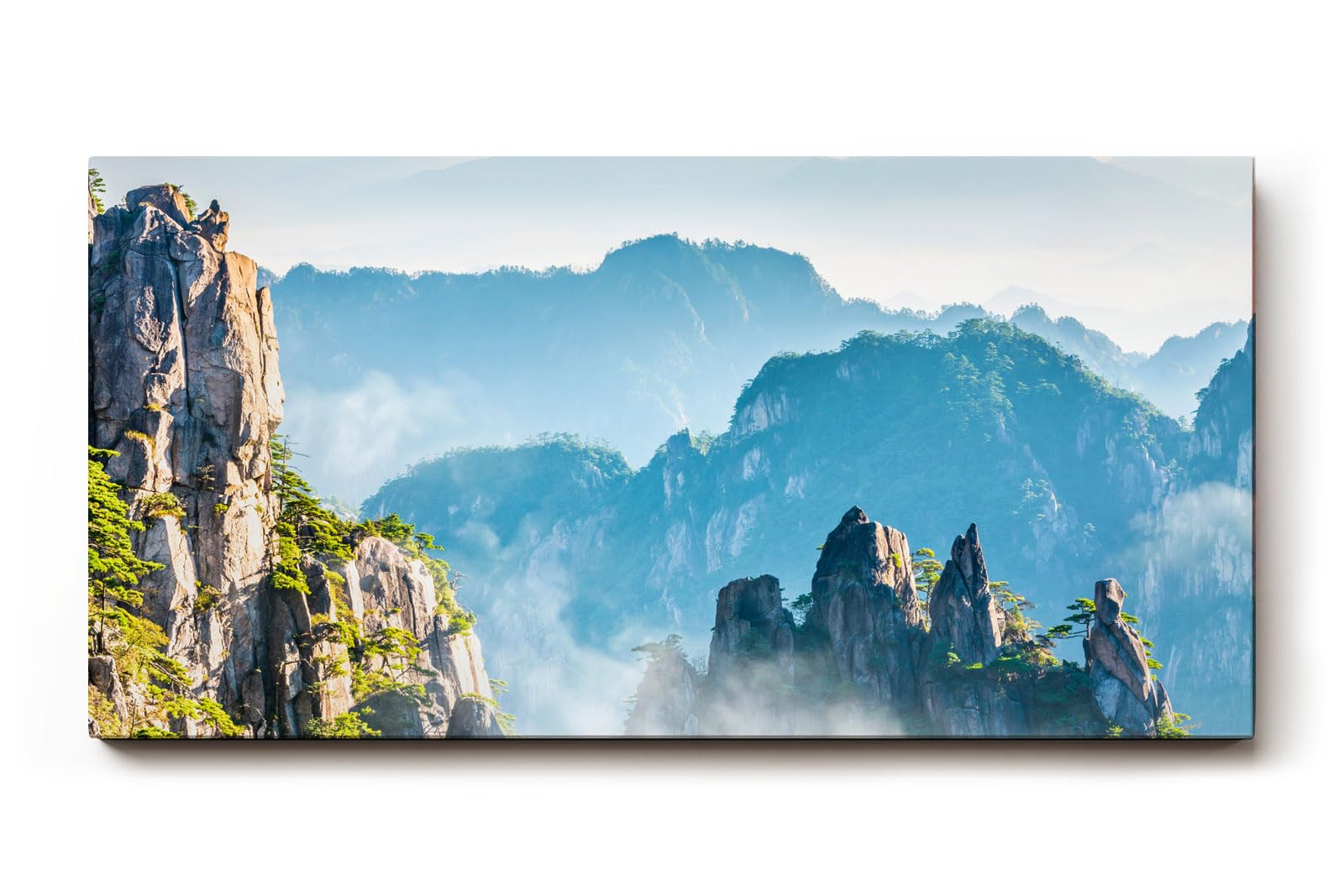 Sinus Art Wandbild 120x80cm Zerklüftete Bergformationen im Nebelmeer für eine ruhige und geheimnisvolle Raumwirkung