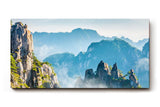 Sinus Art Wandbild 120x80cm Zerklüftete Bergformationen im Nebelmeer für eine ruhige und geheimnisvolle Raumwirkung