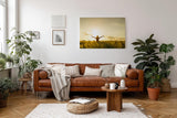 Sinus Art Wandbild 120x80cm Stimmungsvolle Silhouette einer Frau mit erhobenen Armen in einem goldenen Weizenfeld