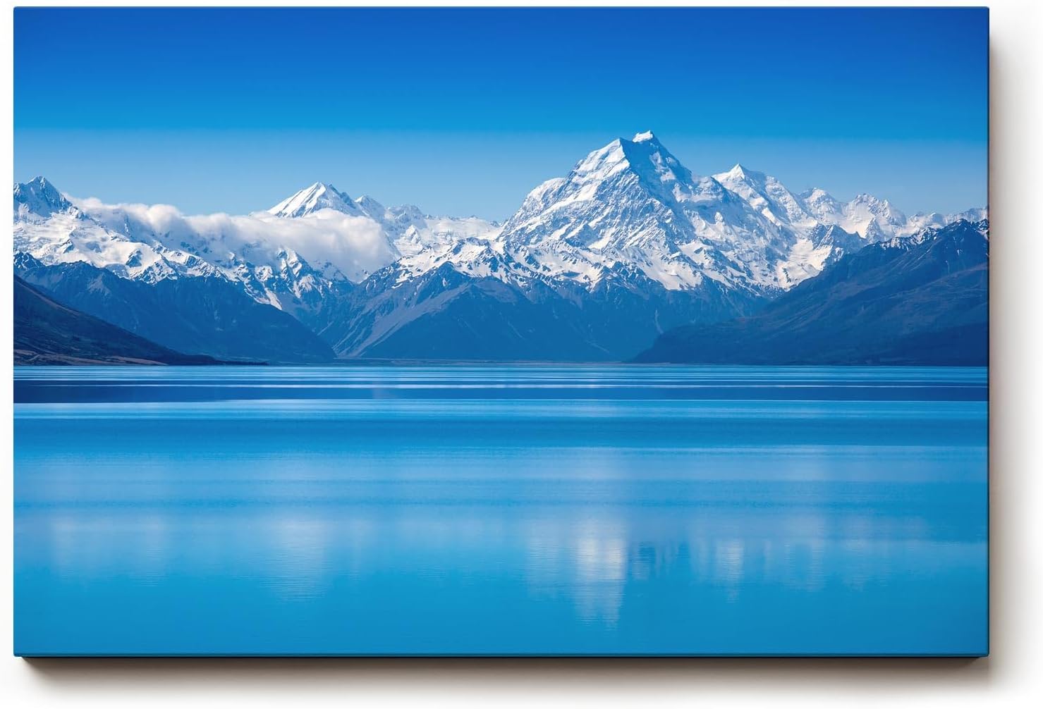 Sinus Art Wandbild 120x80cm Stimmungsvolle Alpenlandschaft mit ruhiger Wasserfläche und majestätischen Gipfeln