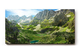 Sinus Art Wandbild 120x80cm Atemberaubendes Hochgebirgspanorama mit grünen Hängen und türkisfarbenem Bergsee im Tal