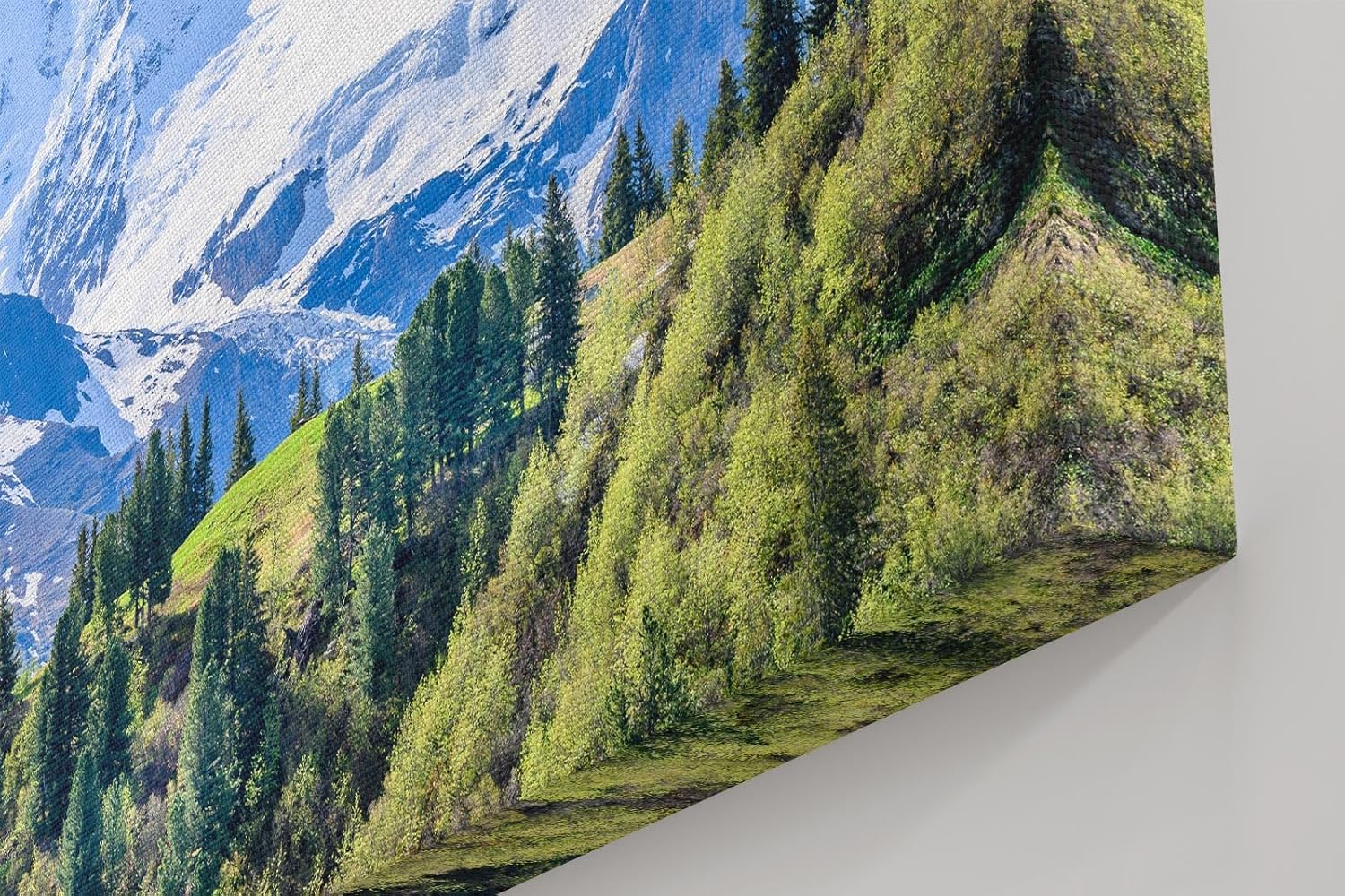 Sinus Art Wandbild 120x80cm Beeindruckendes Panorama mit schneebedeckten Gipfeln und grünen Hängen im Vordergrund