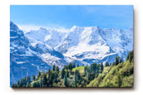 Sinus Art Wandbild 120x80cm Beeindruckendes Panorama mit schneebedeckten Gipfeln und grünen Hängen im Vordergrund