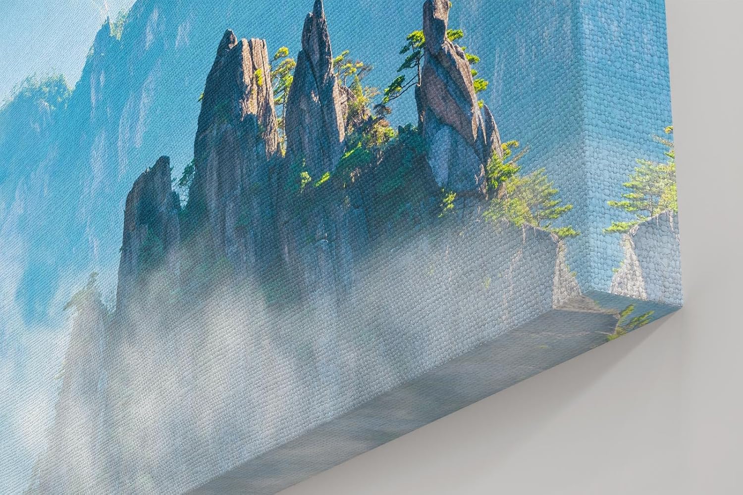 Sinus Art Wandbild 120x80cm Zerklüftete Bergformationen im Nebelmeer für eine ruhige und geheimnisvolle Raumwirkung