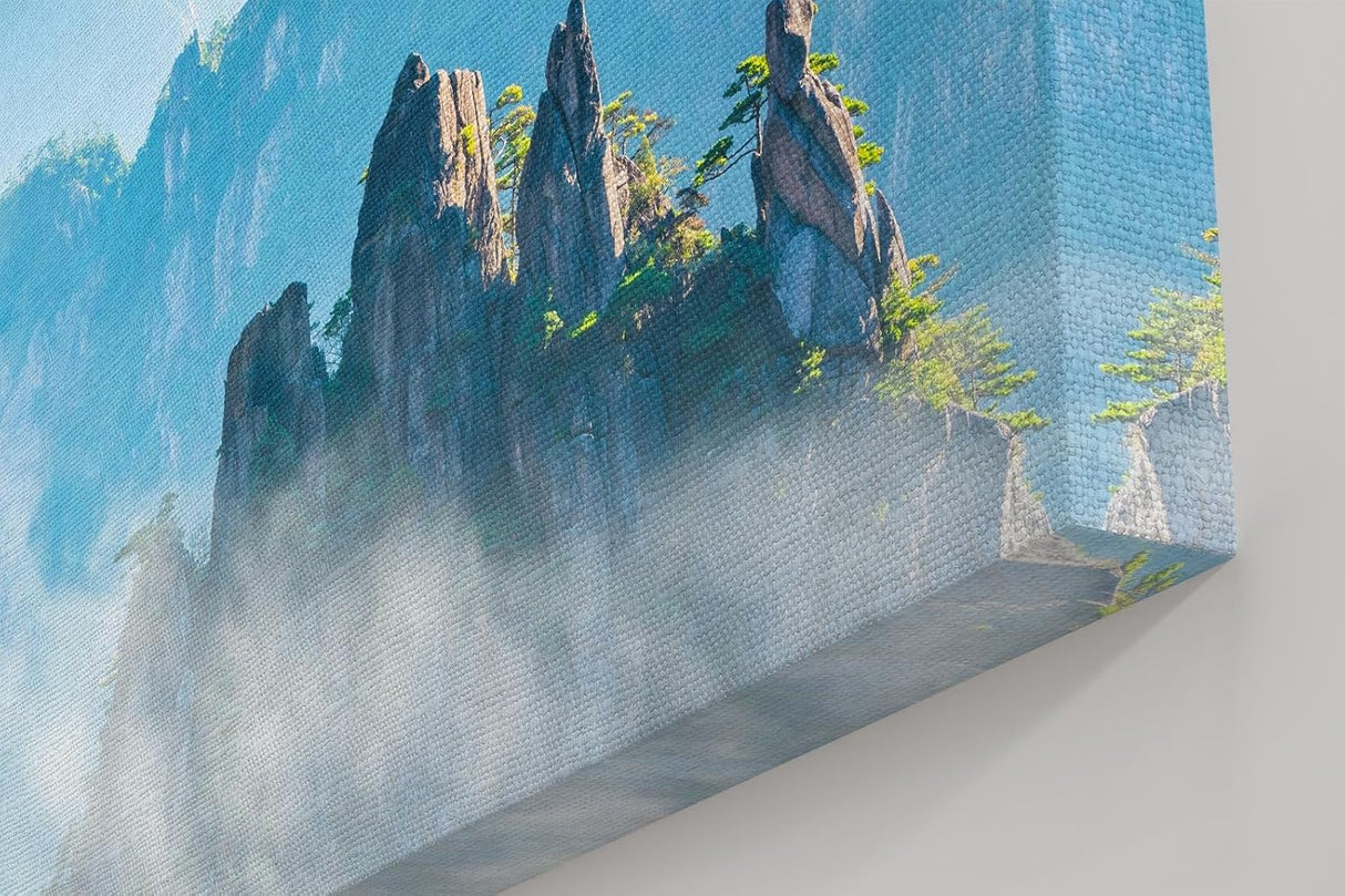 Sinus Art Wandbild 120x80cm Zerklüftete Bergformationen im Nebelmeer für eine ruhige und geheimnisvolle Raumwirkung