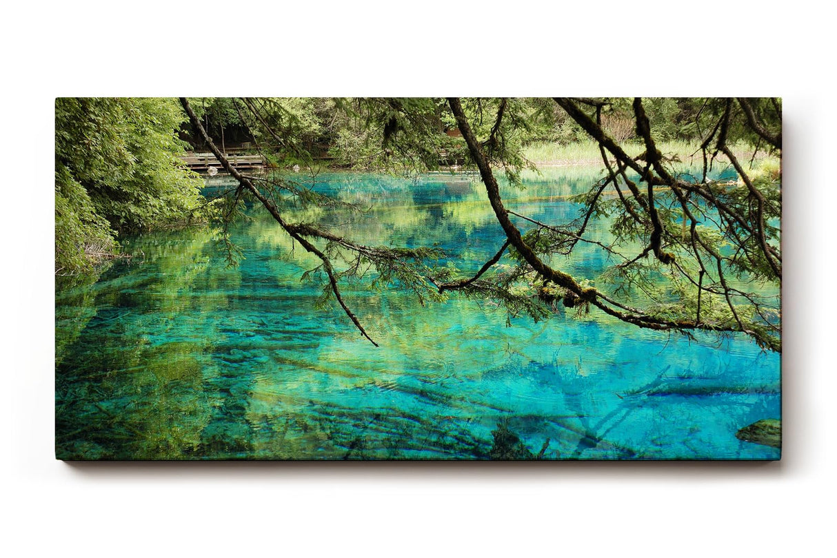 Sinus Art Wandbild 120x80cm Die Äste im Vordergrund und das klare Wasser erzeugen Tiefe und beruhigende Natürlichkeit