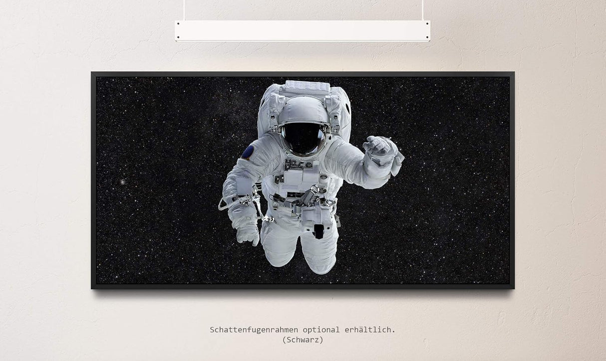 Astronaut im Weltall ca. 130x70cm Wandbild inklusive Schattenfugenrahmen schwarz - Panorama Leinwand Bild XXL Format Wandbilder Wohnzimmer Wohnung Deko Kunstdrucke