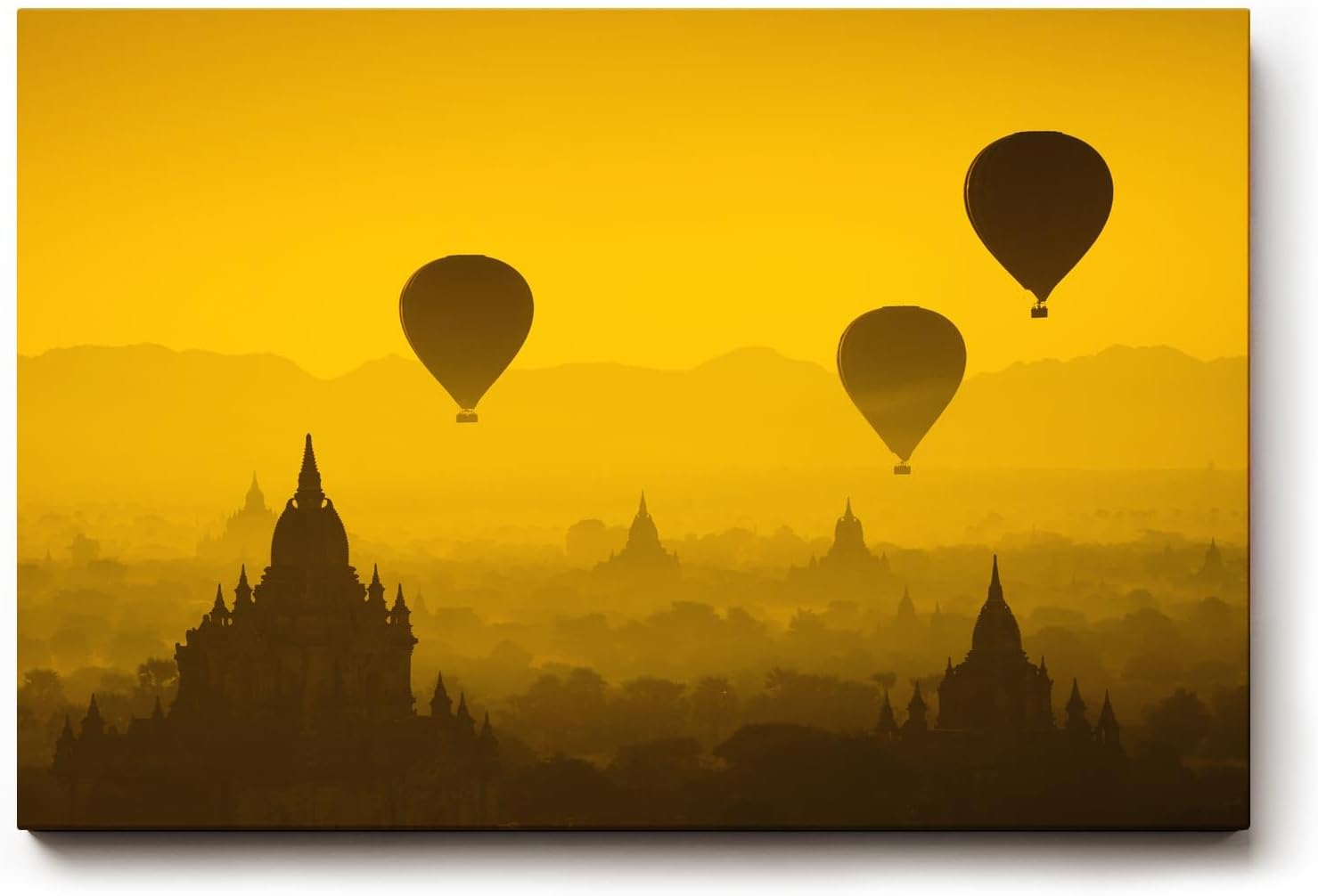 Sinus Art Wandbild 120x80cm Heißluftballons schweben über Pagoden im warmen Licht eines goldenen Himmels