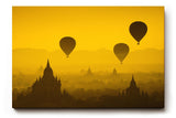 Sinus Art Wandbild 120x80cm Heißluftballons schweben über Pagoden im warmen Licht eines goldenen Himmels
