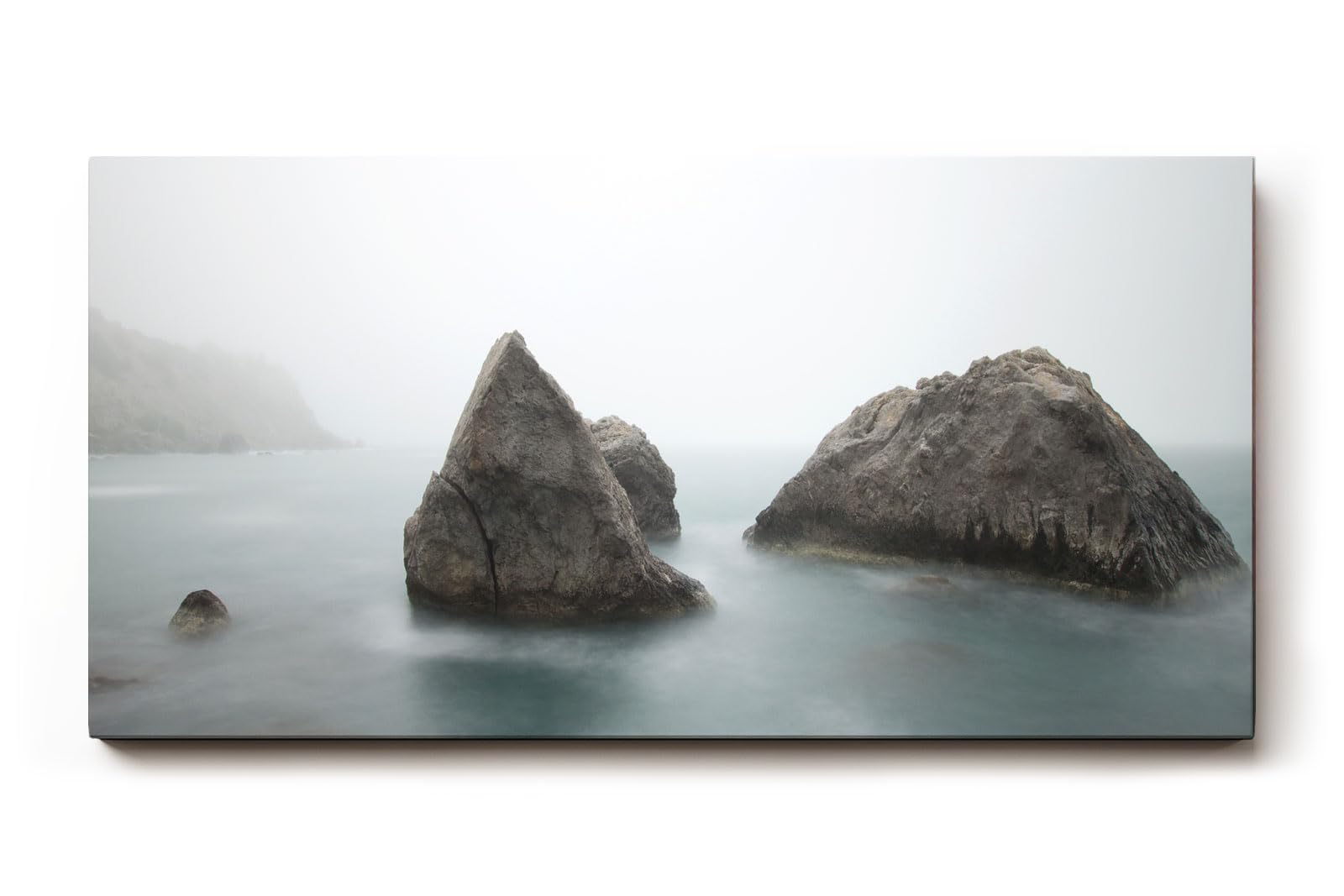 Sinus Art Wandbild 120x80cm Geheimnisvolle Küstenstimmung mit Felsformationen in nebelverhüllter See