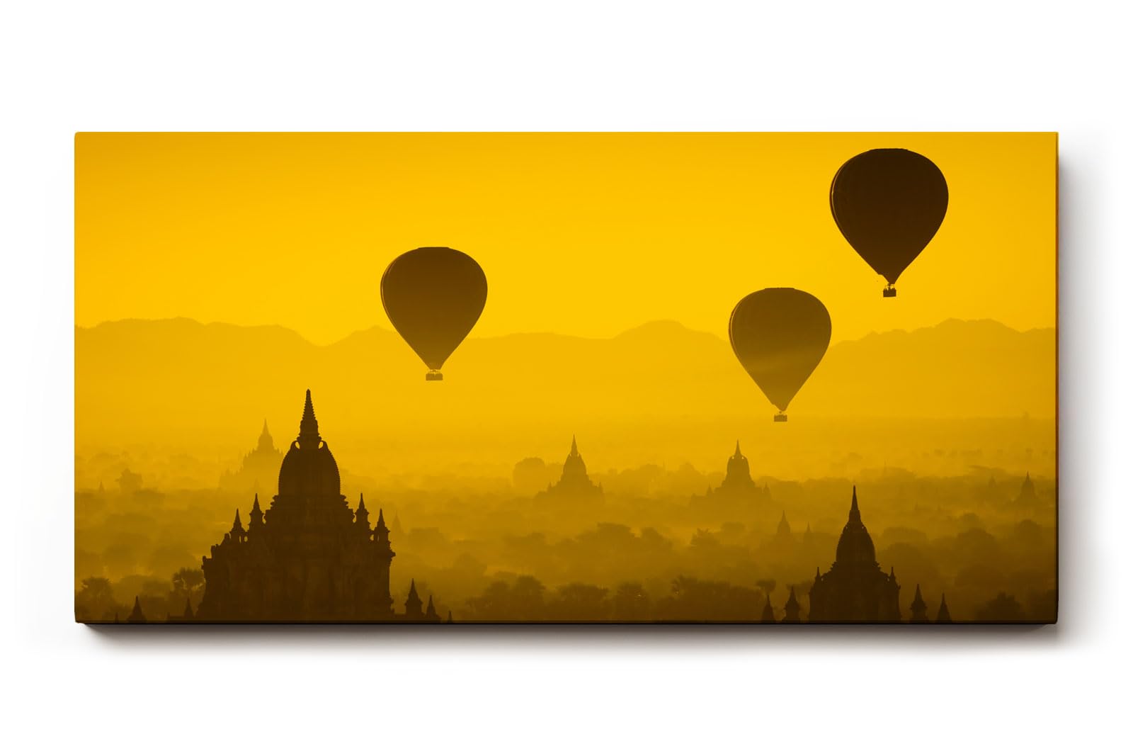 Sinus Art Wandbild 120x80cm Heißluftballons schweben über Pagoden im warmen Licht eines goldenen Himmels