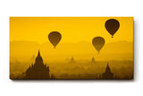 Sinus Art Wandbild 120x80cm Heißluftballons schweben über Pagoden im warmen Licht eines goldenen Himmels