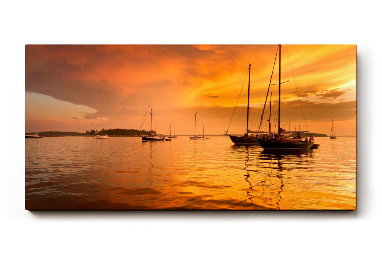 Sinus Art Wandbild 120x80cm Silhouetten von Segelbooten im warmen Abendlicht – maritimes Motiv voller Ruhe und Tiefe