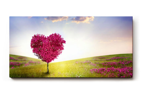 Sinus Art Wandbild 120x80cm Herzförmiger Baum in pinker Blüte in weiter Frühlingslandschaft mit Blumenwiese