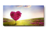 Sinus Art Wandbild 120x80cm Herzförmiger Baum in pinker Blüte in weiter Frühlingslandschaft mit Blumenwiese