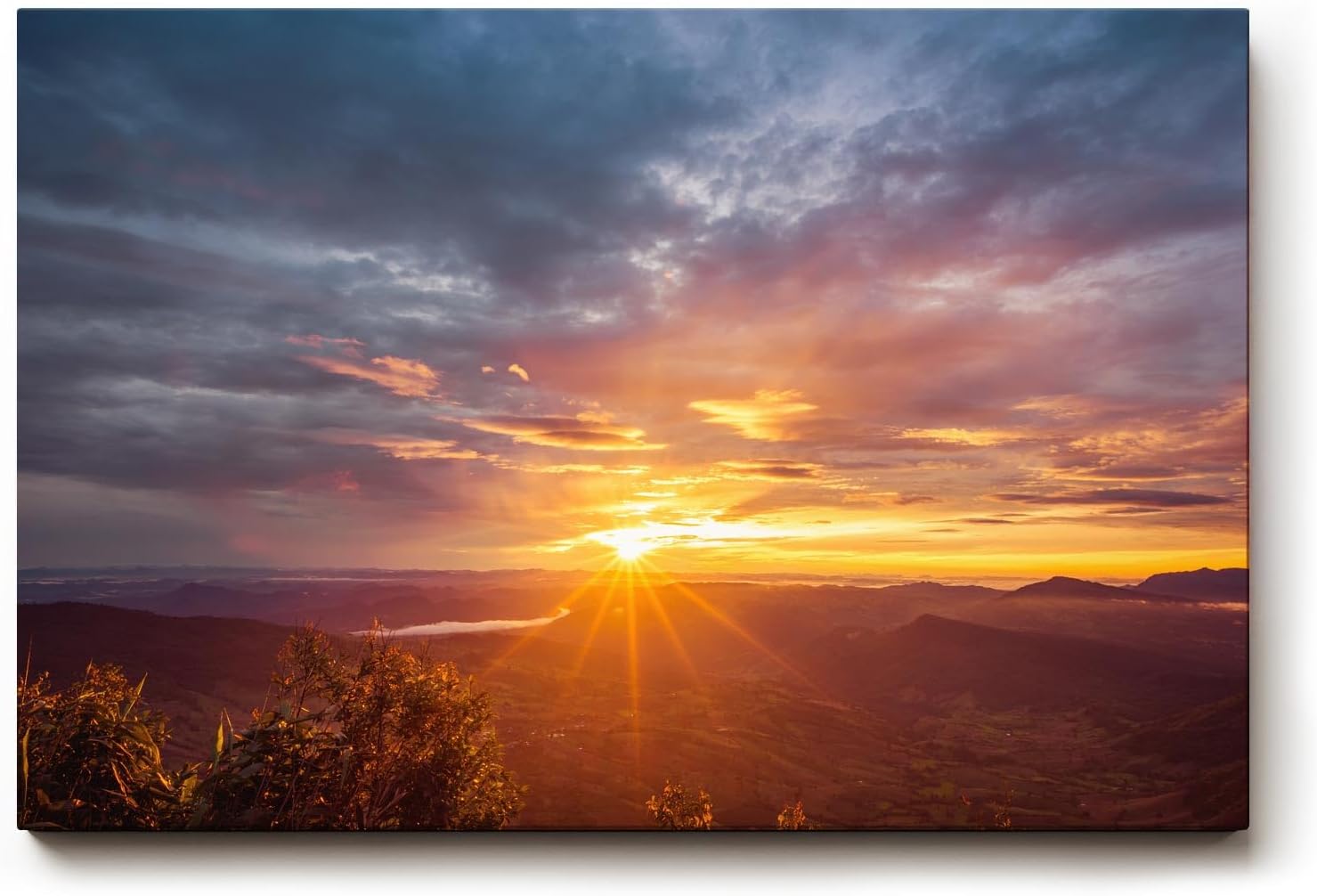 Sinus Art Wandbild 120x80cm Sonnenstrahlen brechen über eine weitläufige Hügellandschaft – beruhigend und lichtvoll