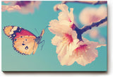 Sinus Art Wandbild 120x80cm Frühlingshaftes Motiv mit Schmetterling an rosa Blüte auf hellblauem Hintergrund